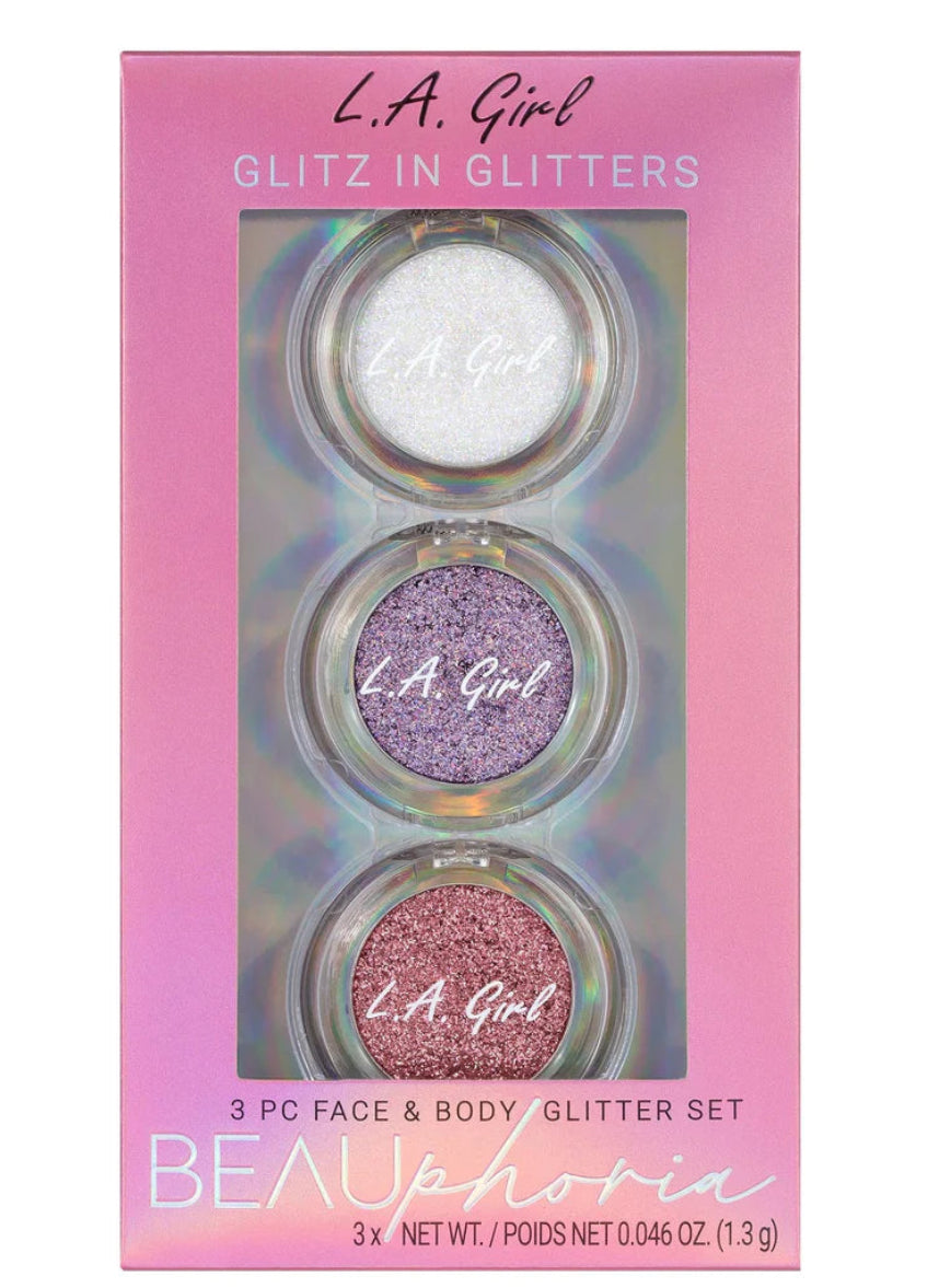 L.A. Girl glitter set packaging with three glitter shades on a pink background