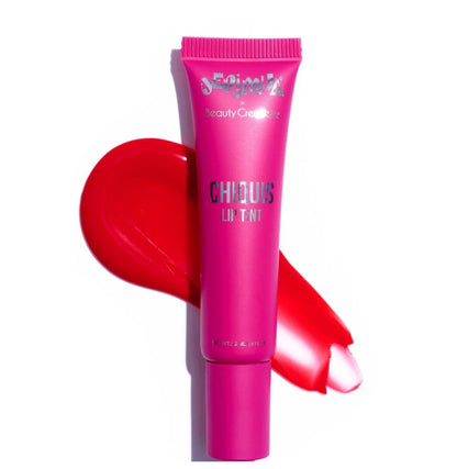 Pink lip tint tube with red smear on a white background