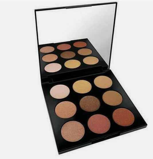 Makeup palette with various shades of eyeshadows on a white background