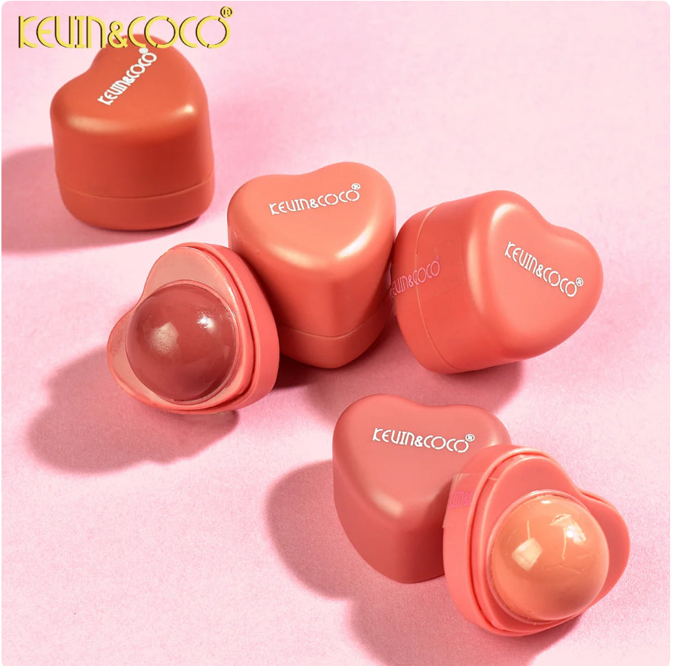 Heart-shaped lip and cheek colors with 'Kevin & Coco' branding on a pink background
