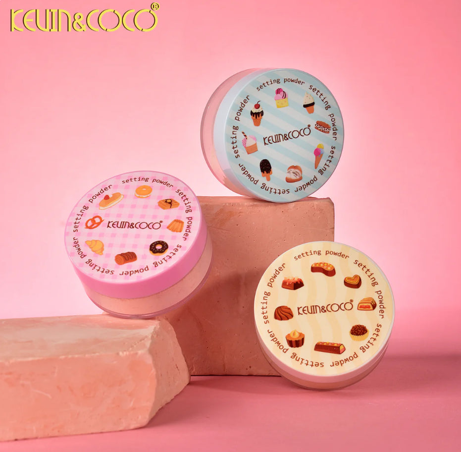 Three KEVIN&COCO cosmetic containers on a pink background