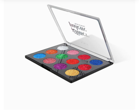 Colorful makeup palette with a clear lid on a white background