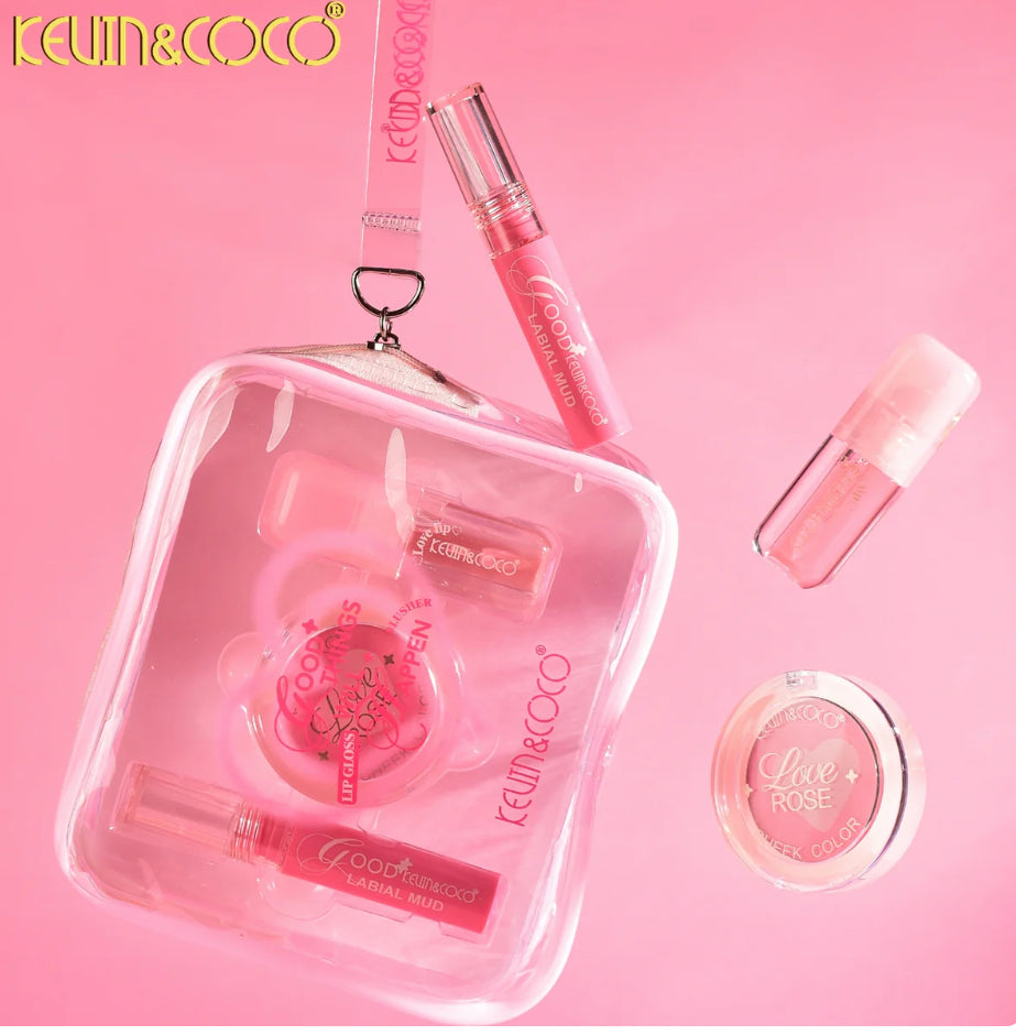 Pink cosmetic set with 'Kevin & Coco' branding on a pink background